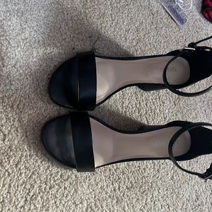 Size seven black heels only worn maybe three times
